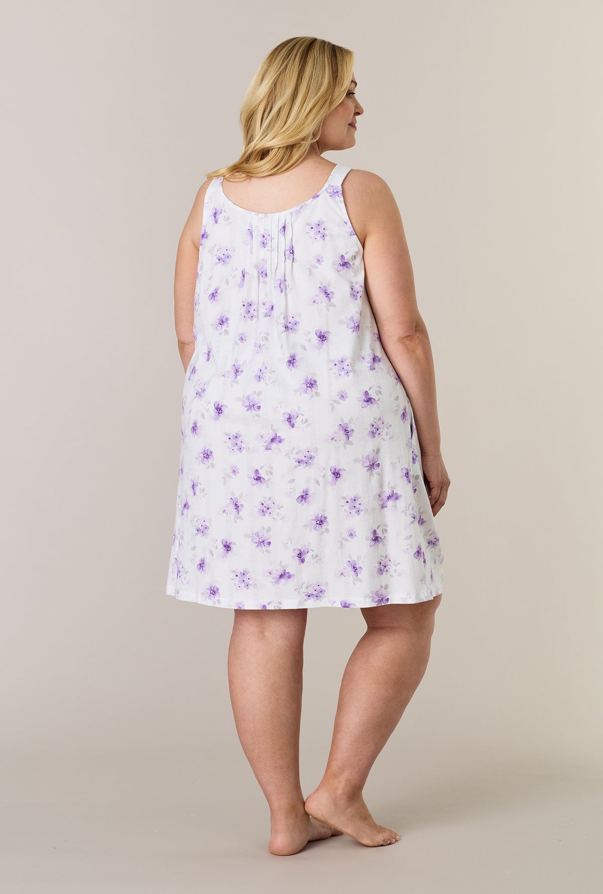 A lady wearing plus size Lilac Blooms Cotton Short Chemise back view