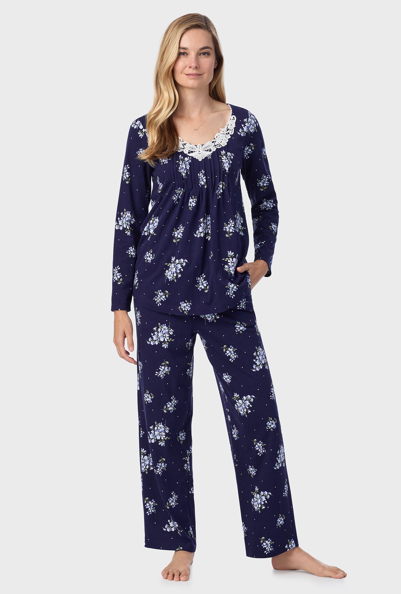 A lady wearing Navy Bouquet Cotton Long Pajama Set