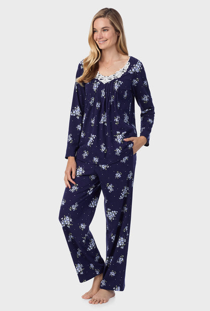 A lady wearing Navy Bouquet Cotton Long Pajama Set