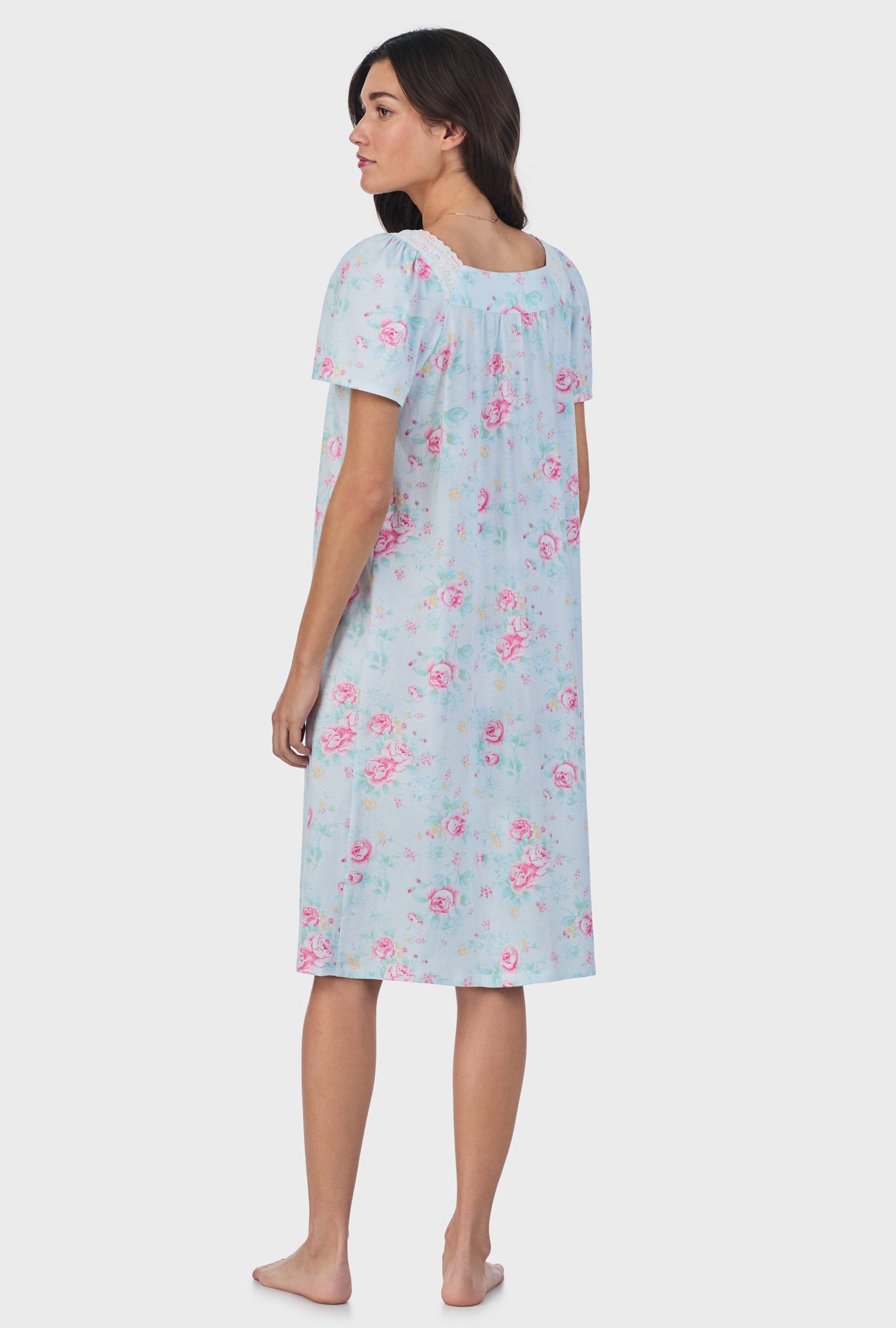 A lady wearing blue short Sleeve Cotton Waltz Nightgown with French Garden print.