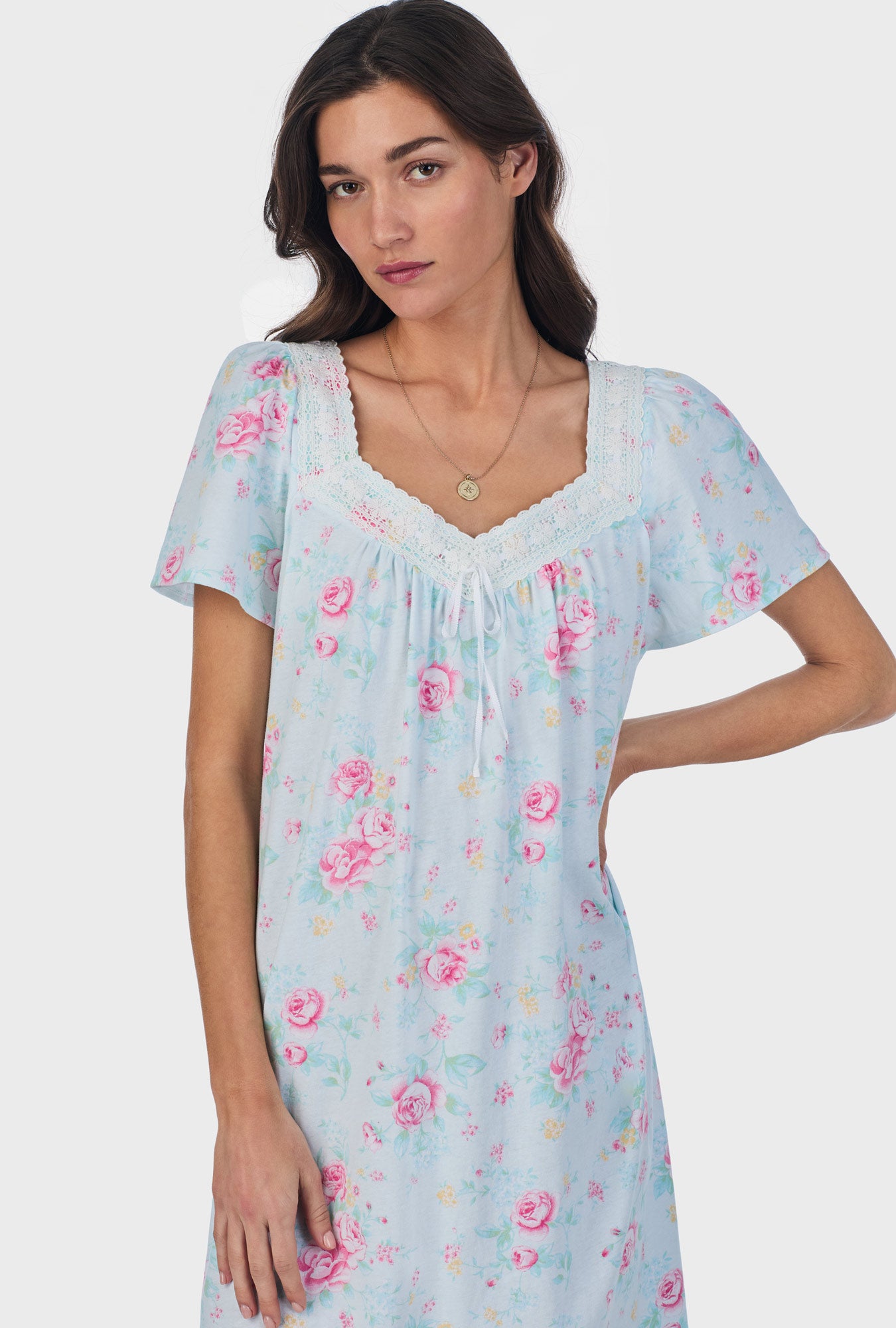 A lady wearing blue short Sleeve Cotton Waltz Nightgown with French Garden print.