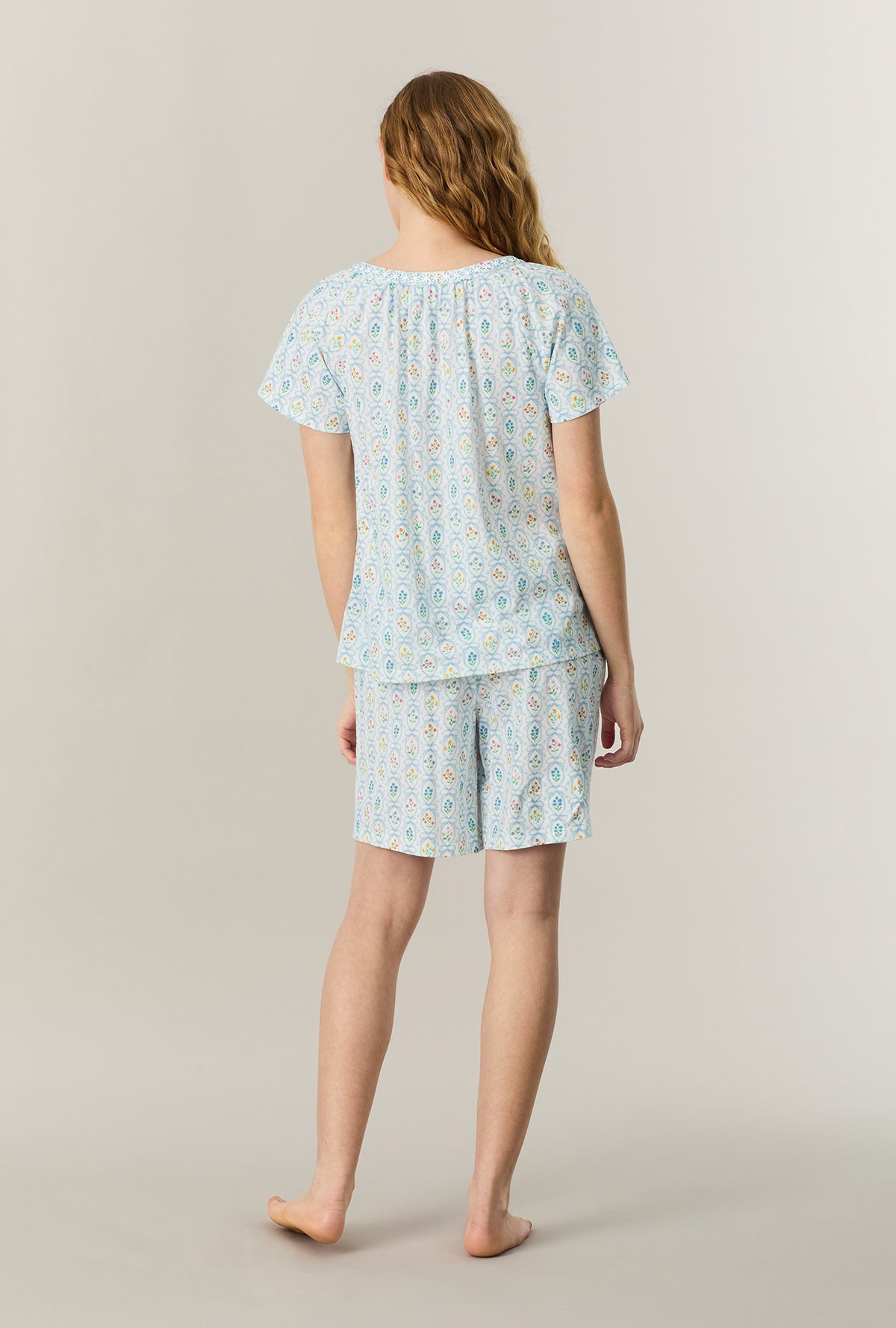 A lady wearing Vintage Garden Cotton Bermuda Pajama Set back view