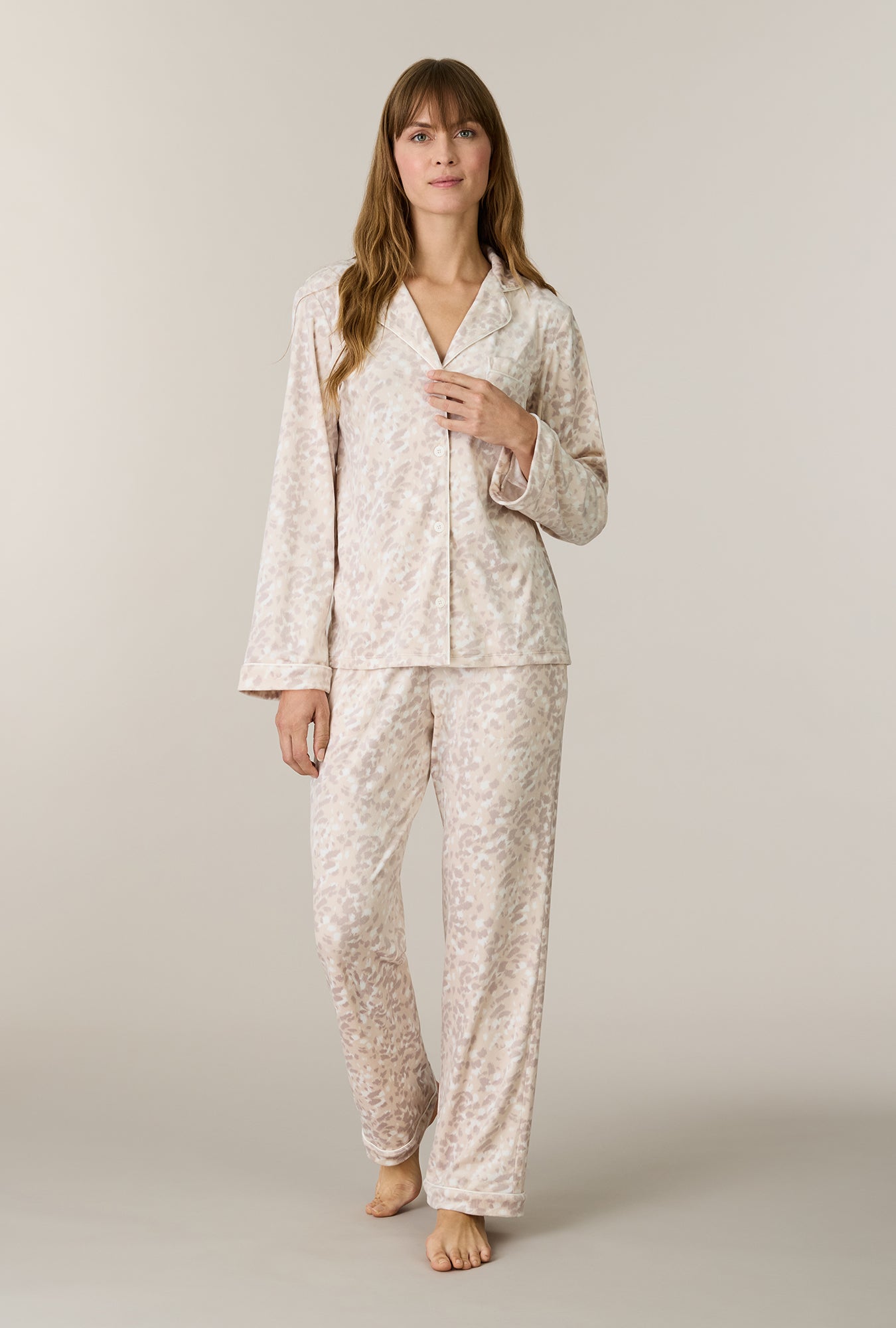 A lady wearing Soft Spots Stretch Velour Notch Collar Long Pajama Set