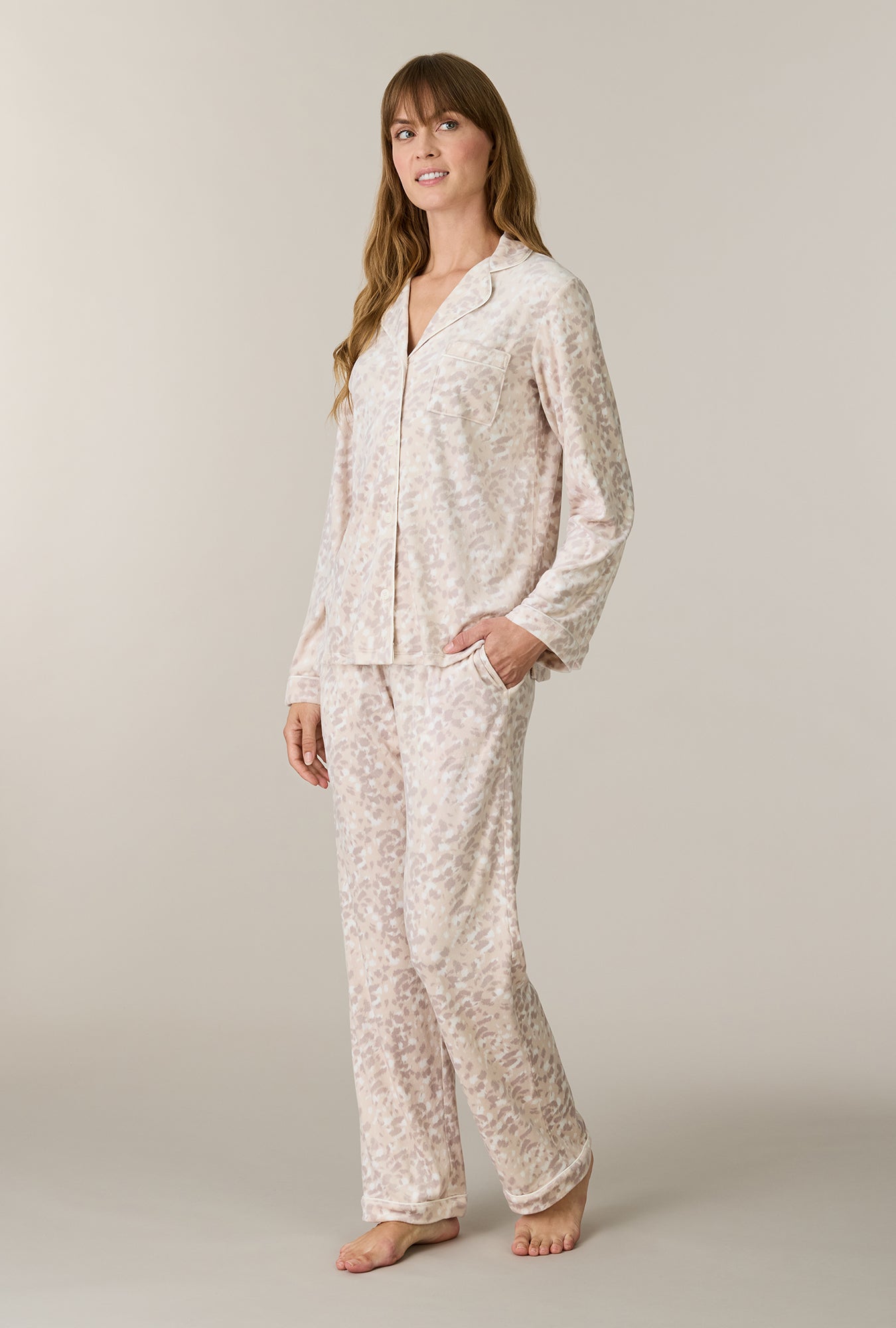 A lady wearing Soft Spots Stretch Velour Notch Collar Long Pajama Set