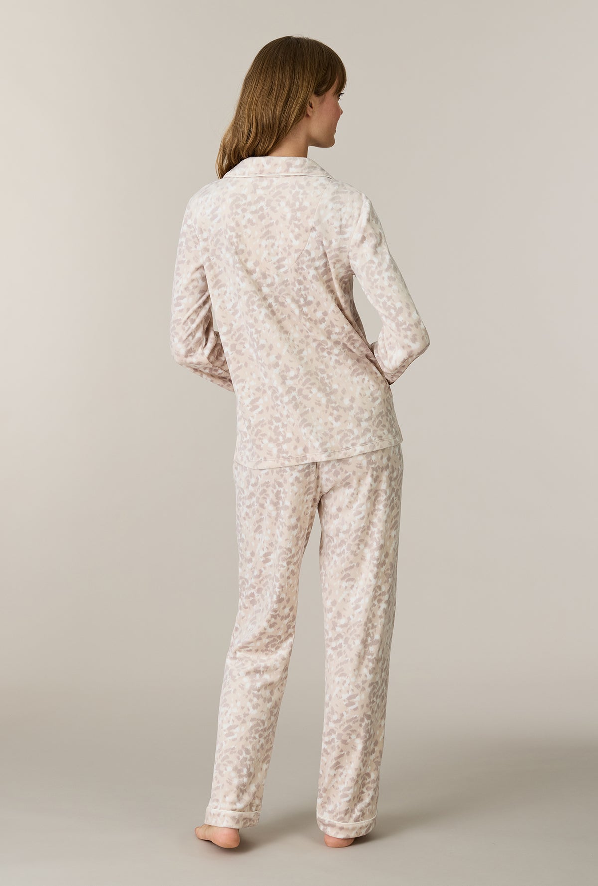 A lady wearing Soft Spots Stretch Velour Notch Collar Long Pajama Set back view