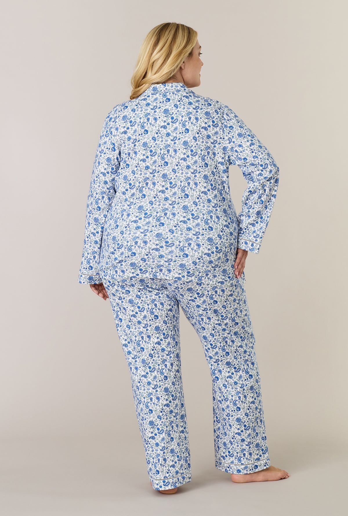 A lady wearing plus size Twilight Paisley Cotton Interlock Long Pajama Set back view