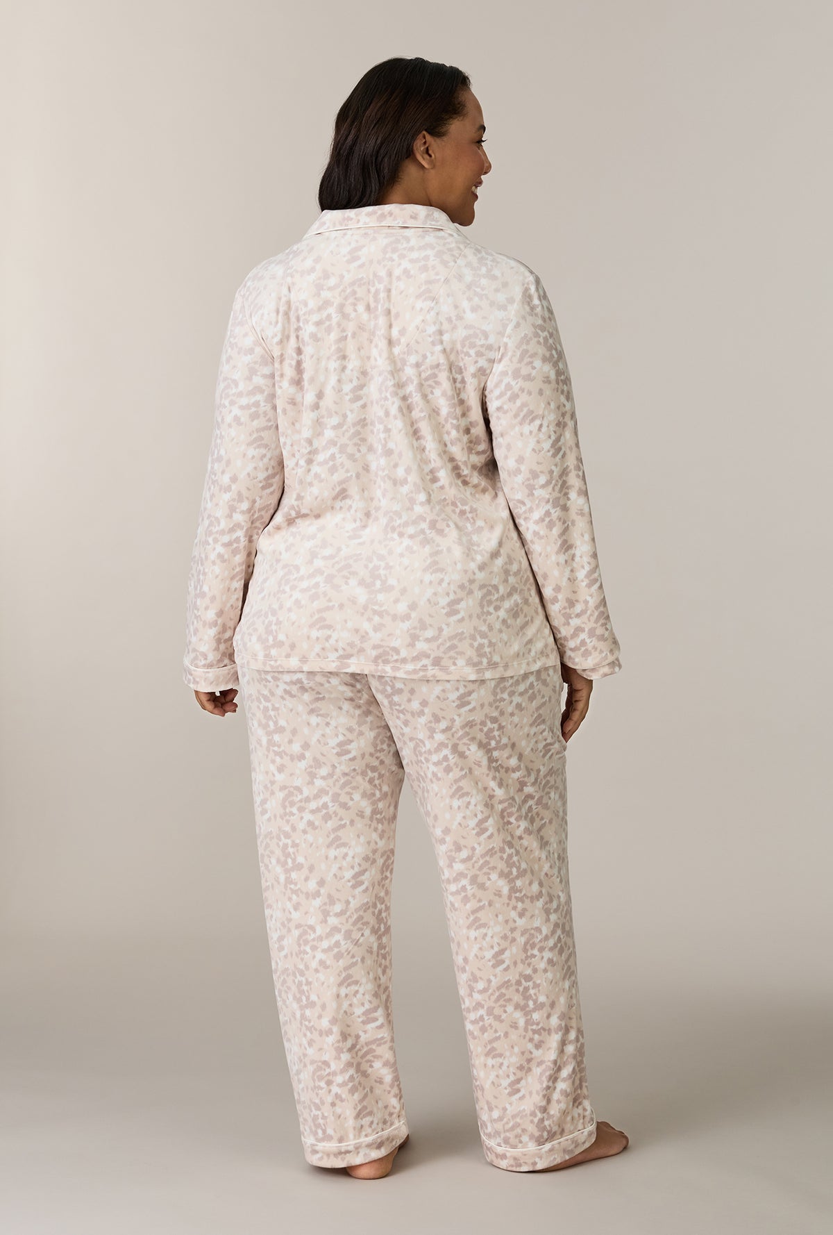 A lady wearing plus size Soft Spots Stretch Velour Notch Collar Long Pajama Set back view
