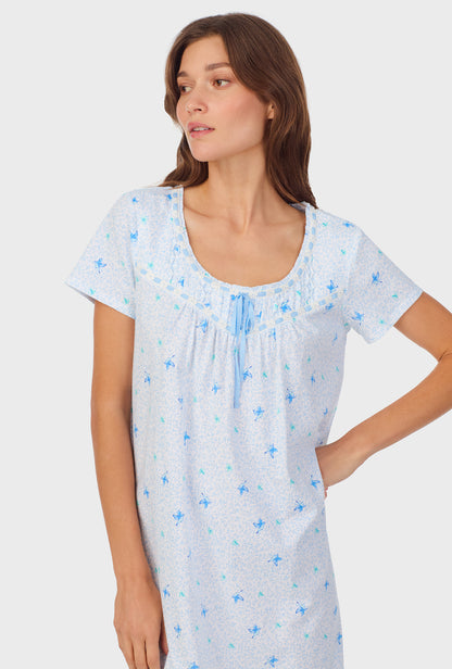 A lady wearing Blue Hummingbird Cotton Short Nightgown