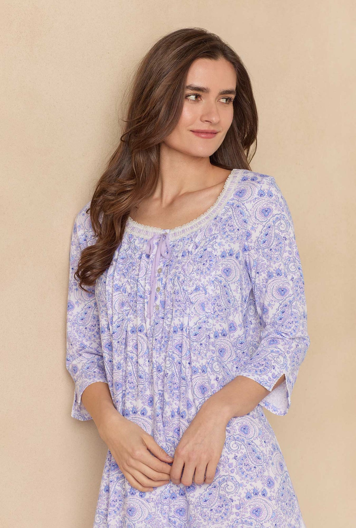 A lady wearing Purple Paisley 3/4 Sleeve Cotton Short Nightgown