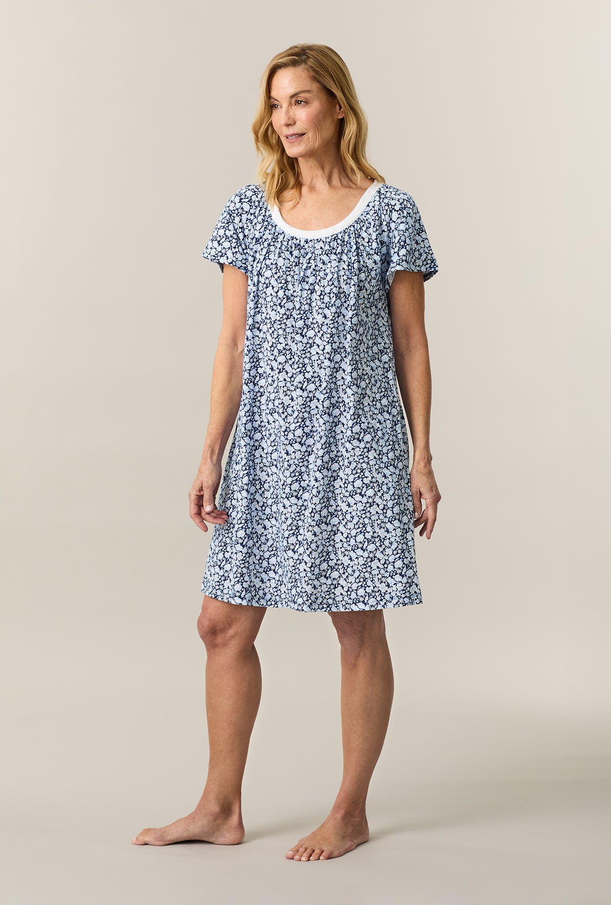 A lady wearing Blue Depths Floral Short Sleeve Cotton Short Nightgown