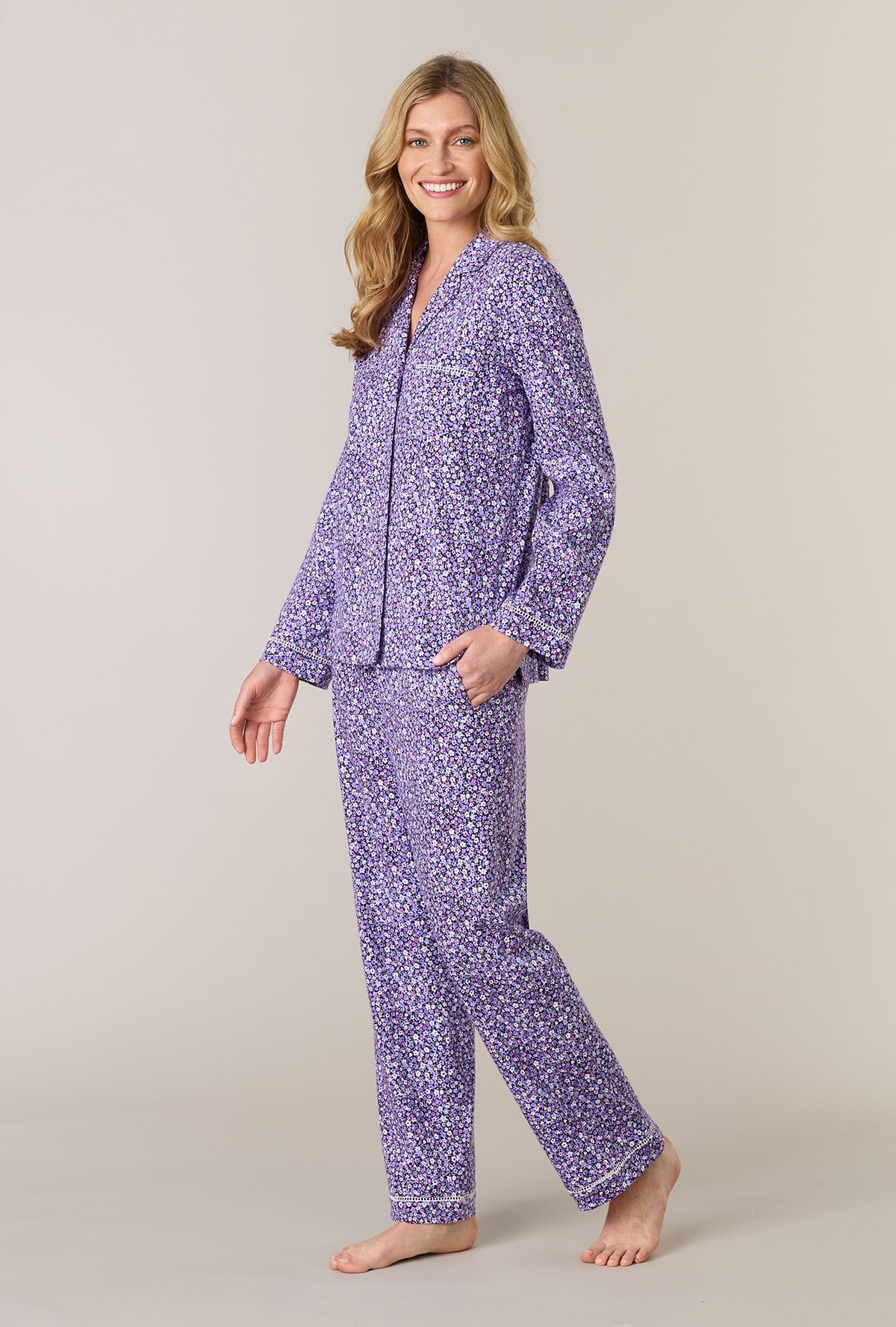 A lady wearing Lilac Garden Cotton Interlock Long Pajama Set posing to her side with a smile