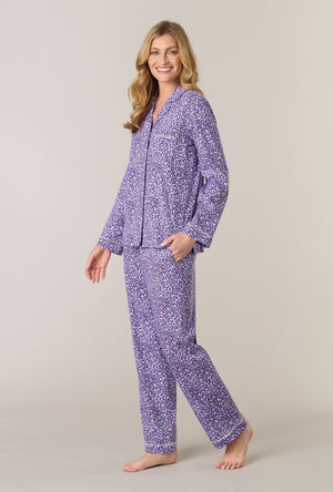 A lady wearing Lilac Garden Cotton Interlock Long Pajama Set posing to her side with a smile