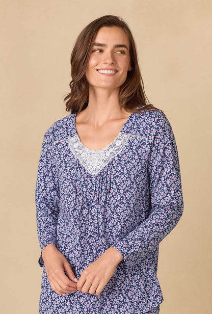 A lady wearing Navy Reverie Ditsy Cotton Knit Long Pajama