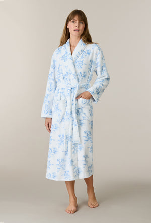 A lady wearing Winter Blue Floral Wrap Chenille Ballet Robe