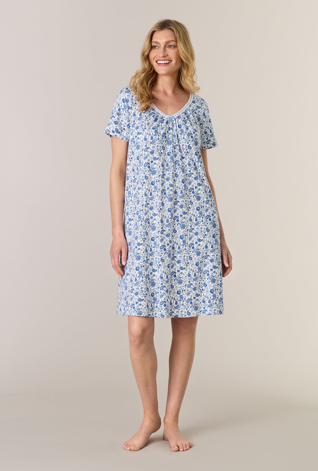 A lady wearing Twilight Paisley Short Sleeve Cotton Interlock Short Nightgown