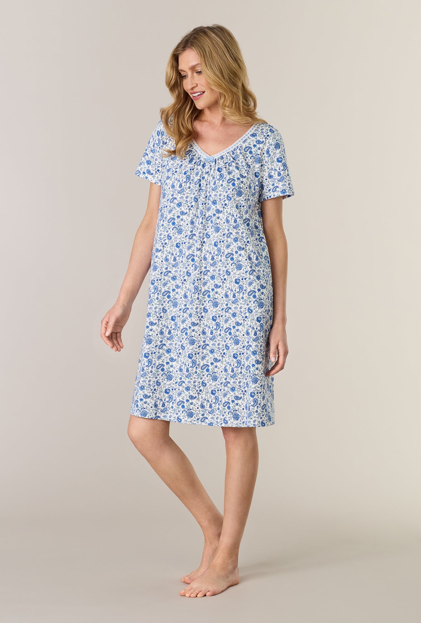 A lady wearing Twilight Paisley Short Sleeve Cotton Interlock Short Nightgown
