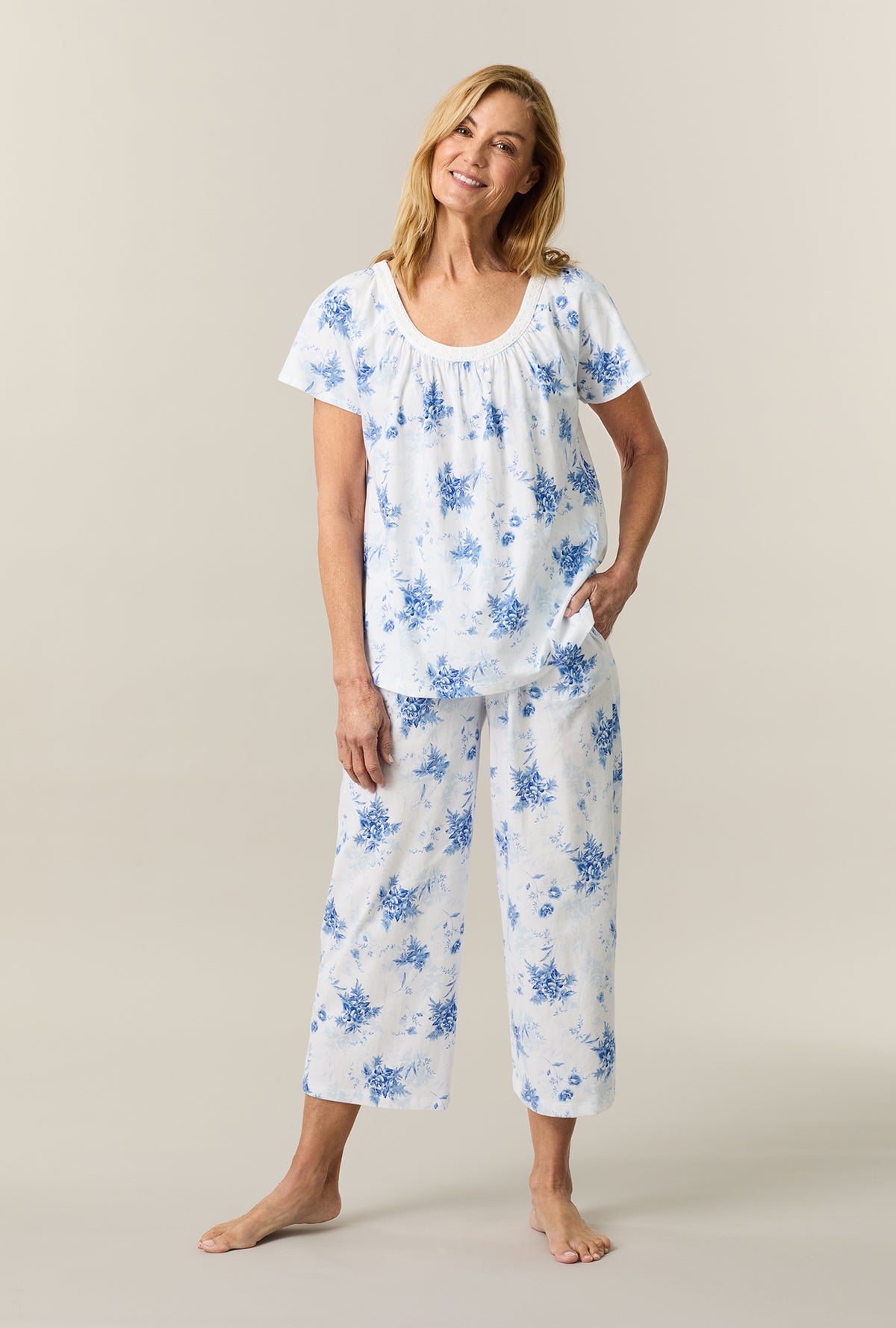 A lady wearing White Floral Cotton Capri Pajama Set