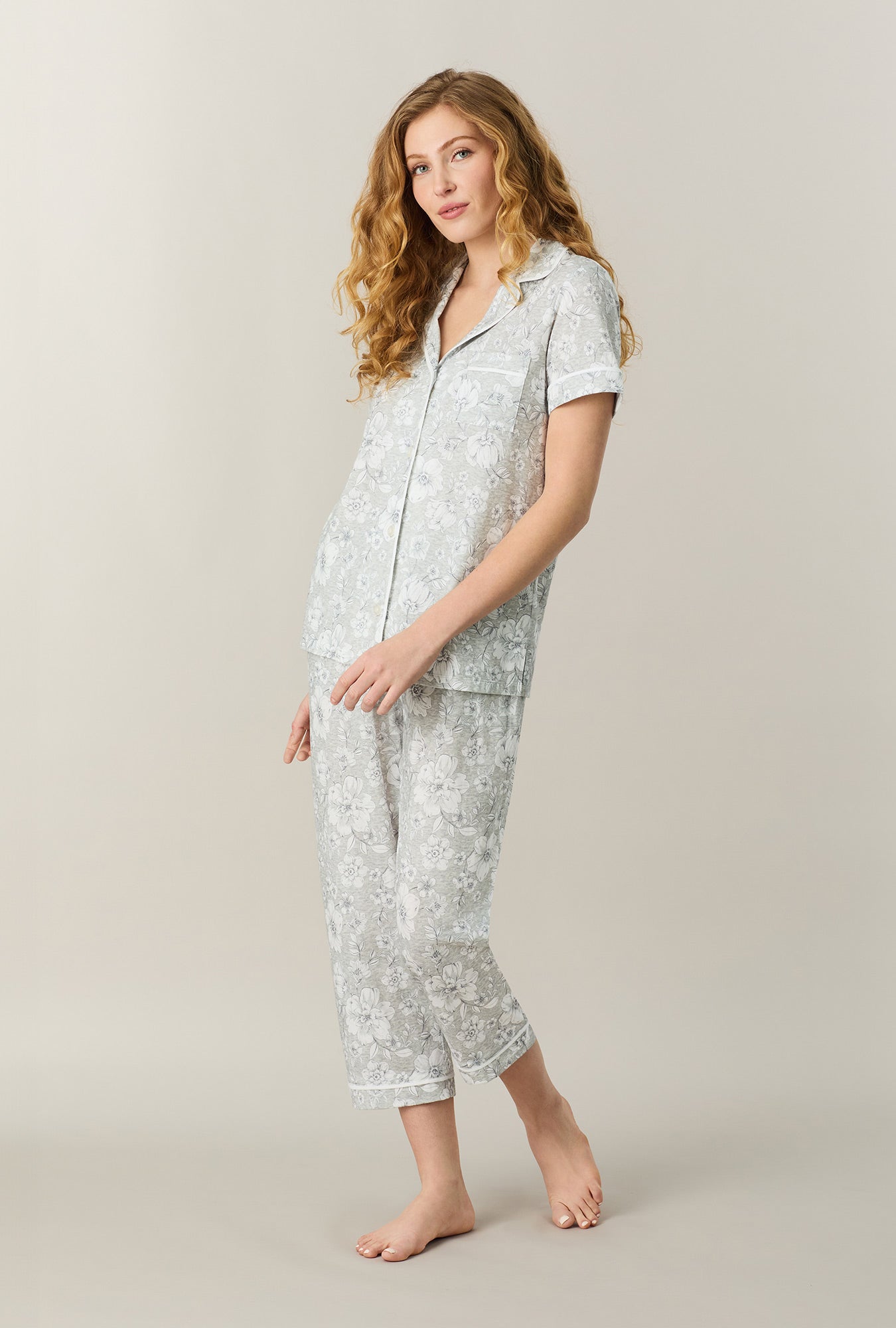 A lady wearing Grey Heather Floral Cotton Capri Pajama Set