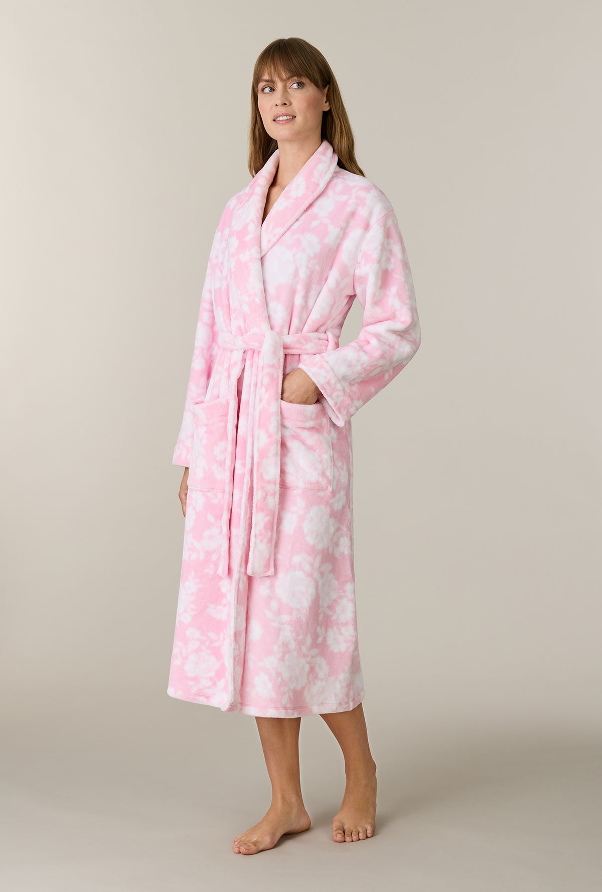 A lady wearing Pink Peonies Wrap Chenille Ballet Robe looking up