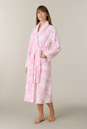 A lady wearing Pink Peonies Wrap Chenille Ballet Robe looking up