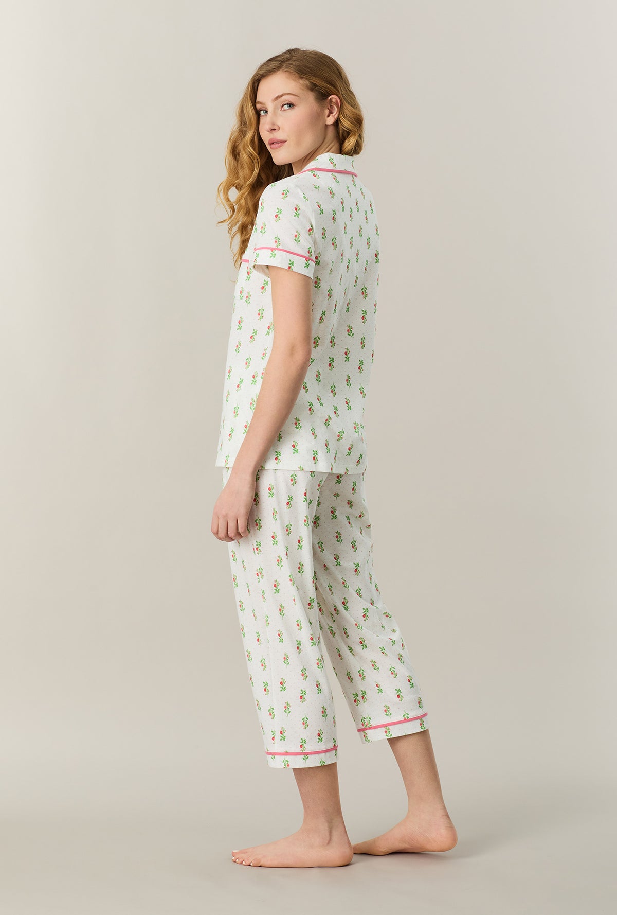 A lady wearing Floral Whisper Cotton Capri Pajama Set back view