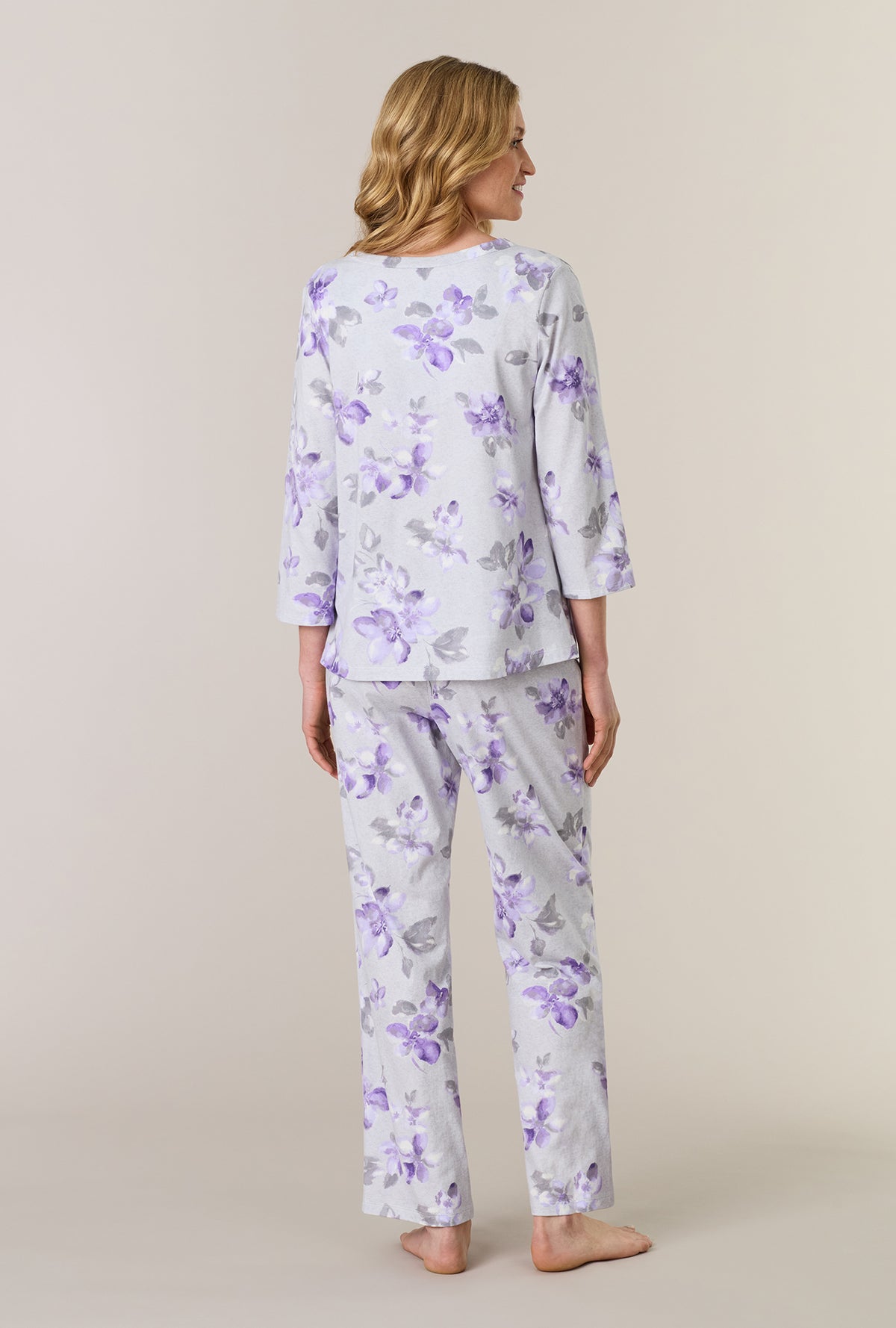 A lady wearing Shadow Petals Cotton Long Pajama Set back view