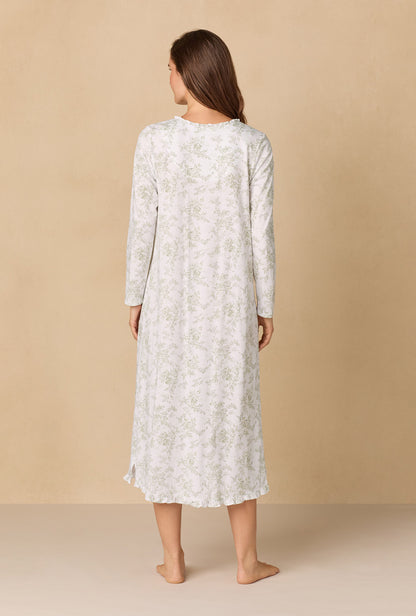A lady wearing Whispering Rose Toile Long Cotton Knit Nightgown