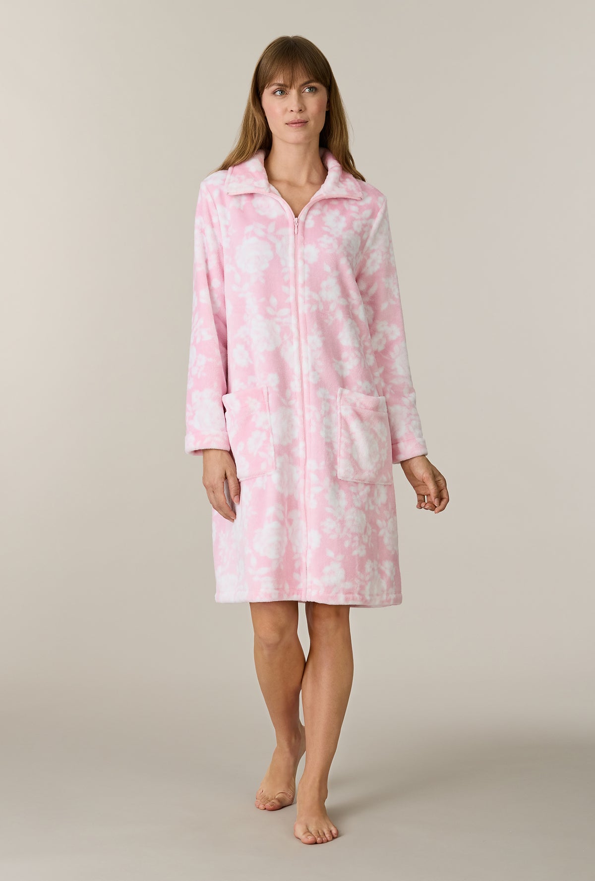 A lady wearing Pink Peonies Chenille Short Zip Robe