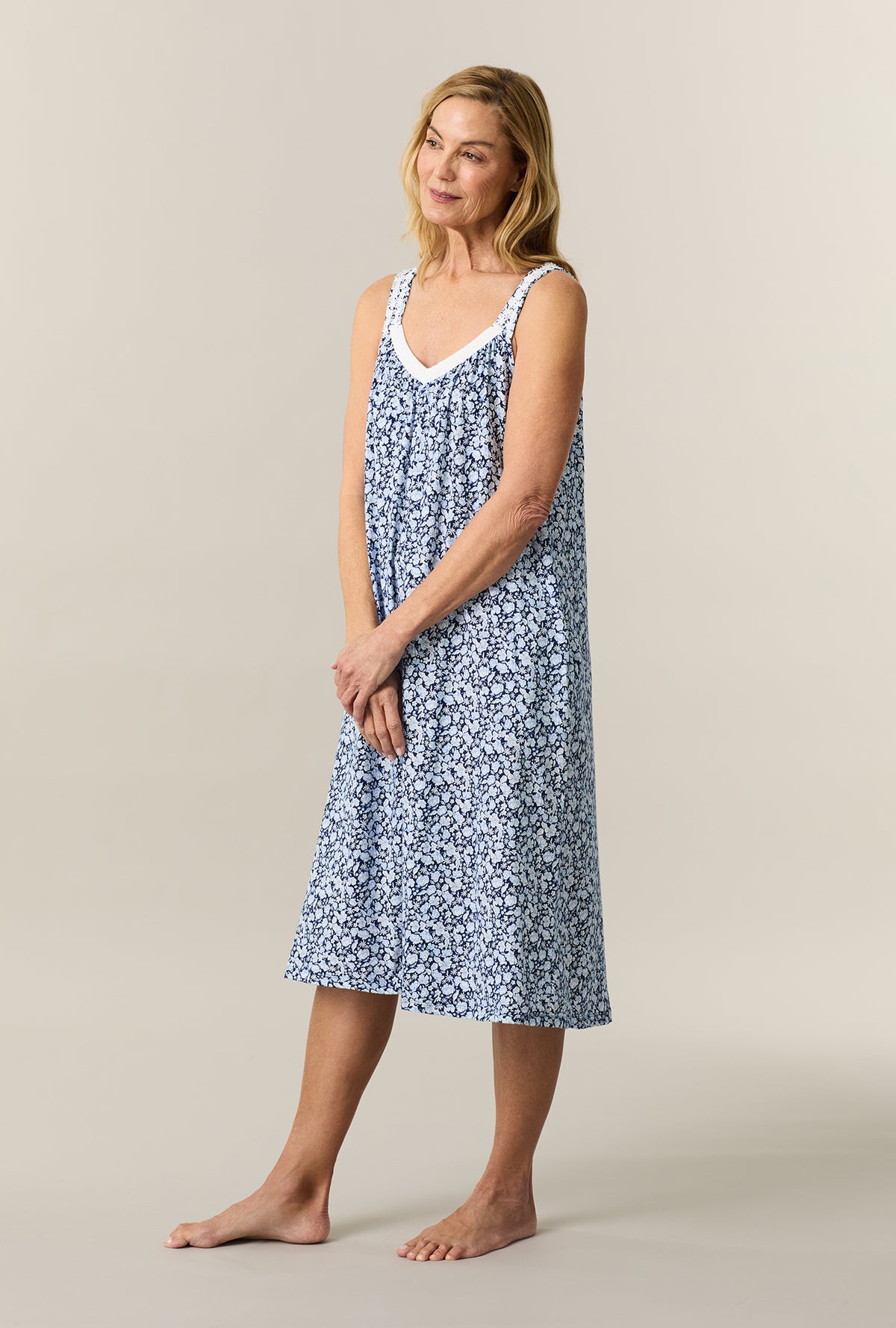 A lady wearing Blue Depths Floral Cotton Waltz Chemise