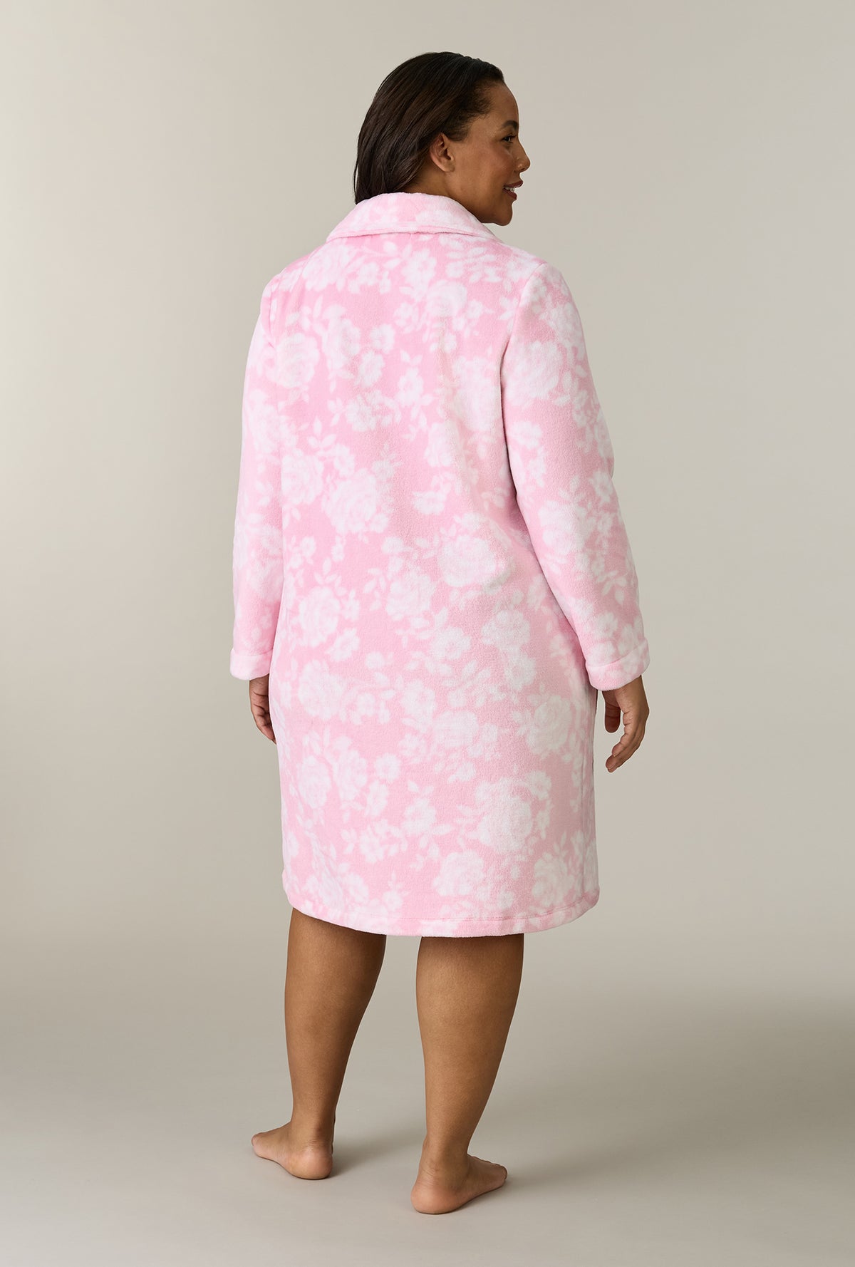 A lady wearing plus size Pink Peonies Chenille Short Zip Robe back view