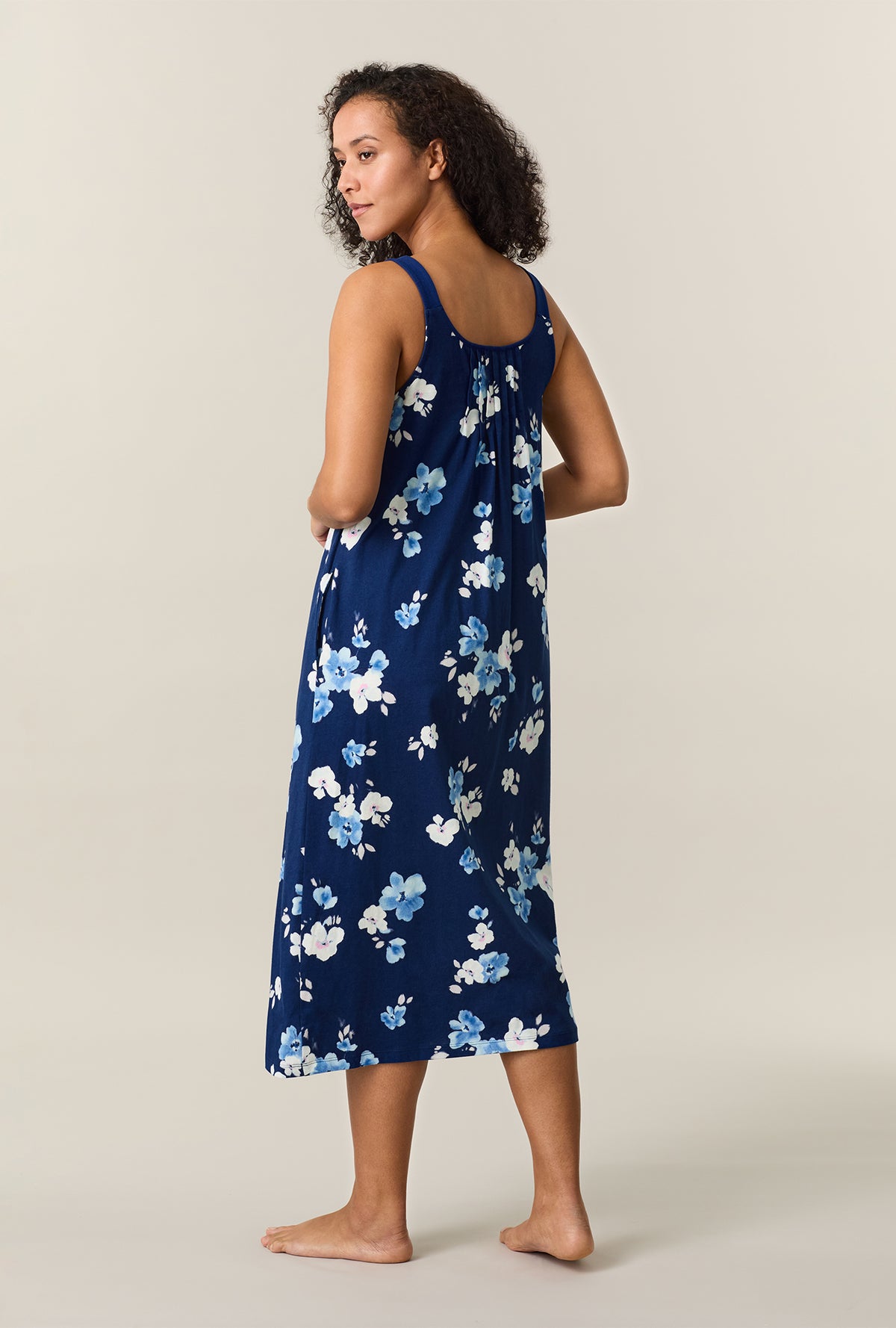 A lady wearing Blue Depths Blooms Cotton Long Chemise