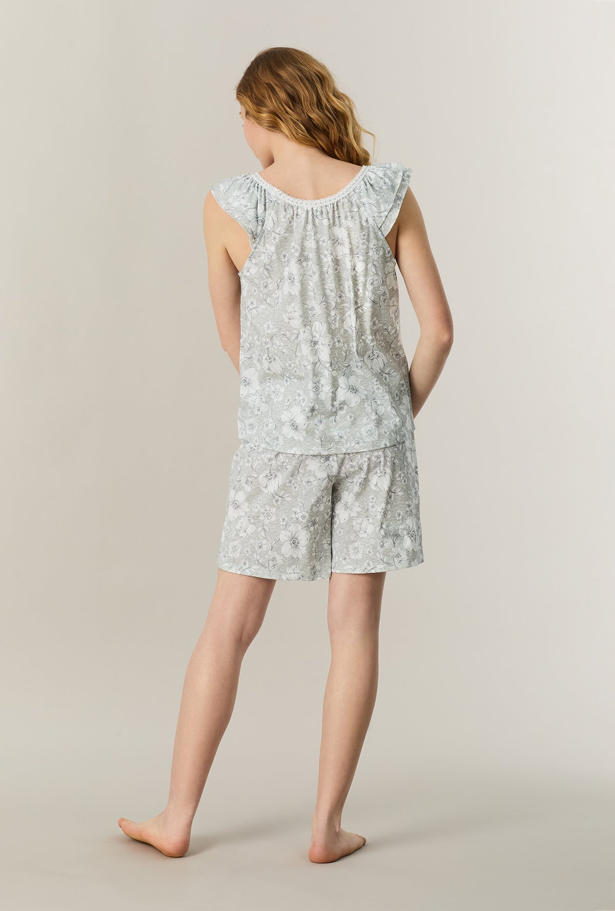 A Lady wearing Grey Heather Floral Cotton Bermuda Pajama Set back view