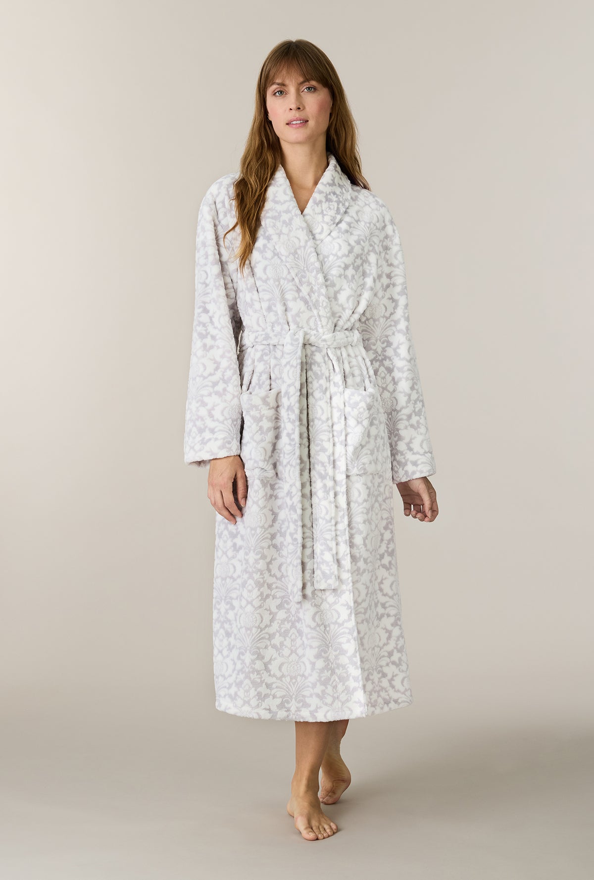 A lady wearing Pearl Damask Wrap Two-Tone Velour Ballet Robe