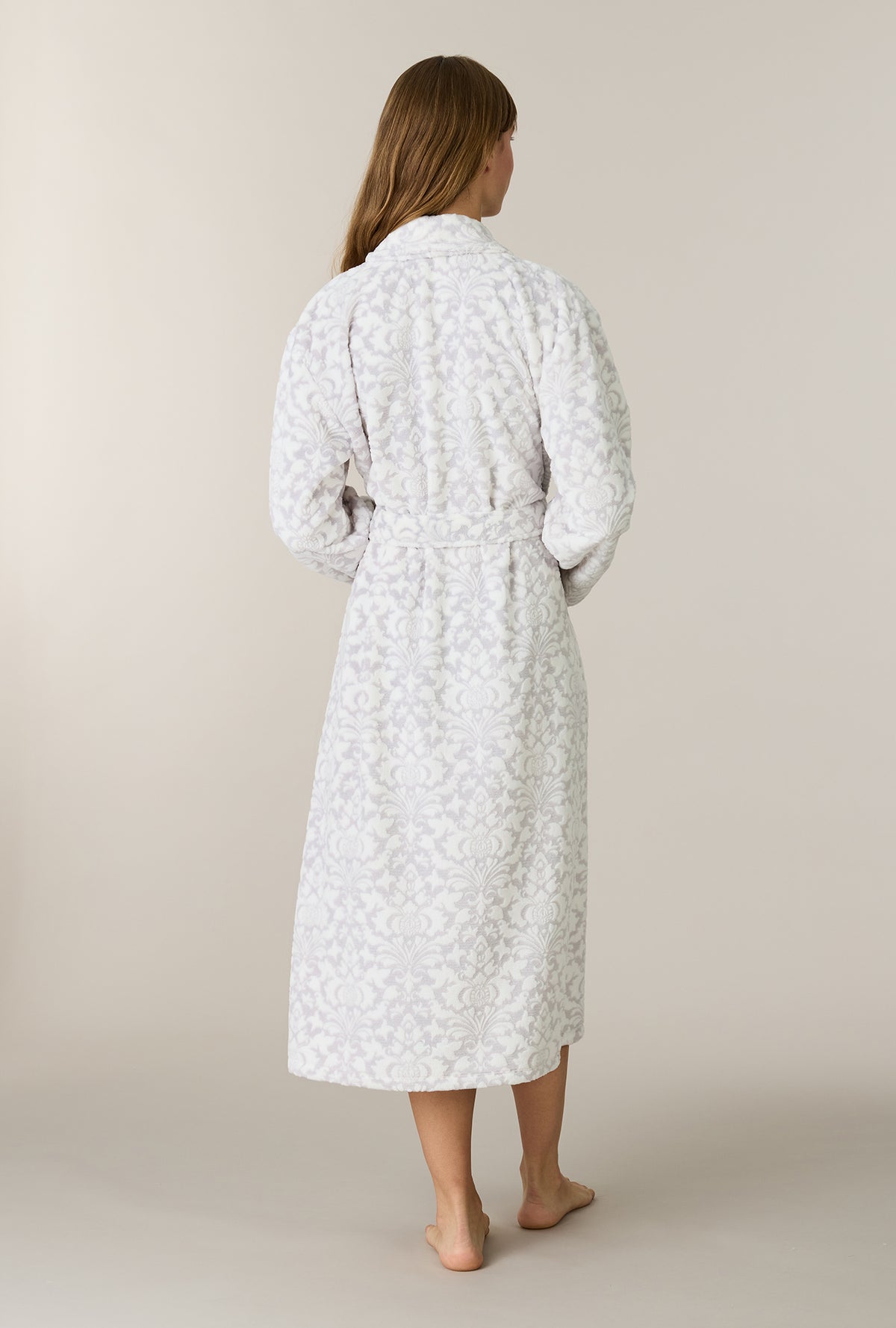 A lady wearing Pearl Damask Wrap Two-Tone Velour Ballet Robe back view