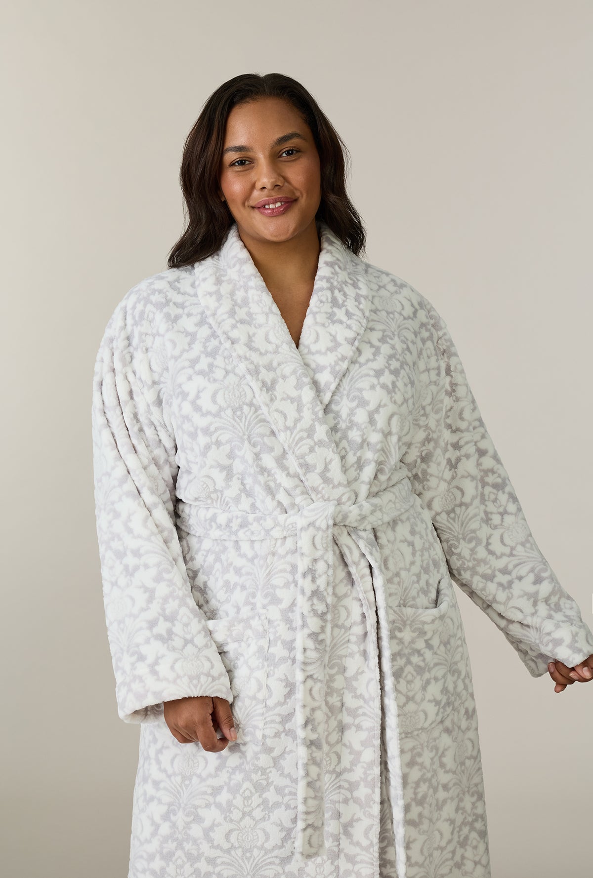 A lady wearing plus size Pearl Damask Wrap Two-Tone Velour Ballet Robe closer look