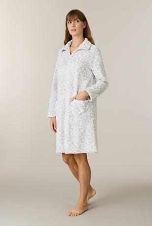 A lady wearing Pearl Damask Two-Tone Velour Short Zip Robe
