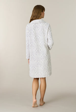 A lady wearing Pearl Damask Two-Tone Velour Short Zip Robe back view