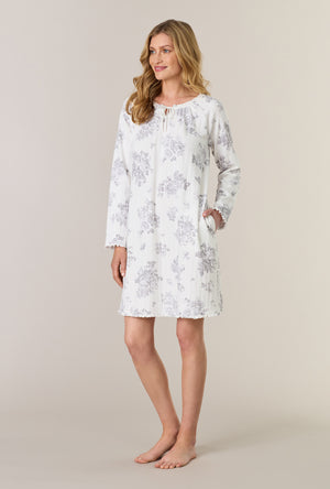 A lady wearing Morning Mist Long Sleeve Cotton Pointelle Short Nightgown looking side