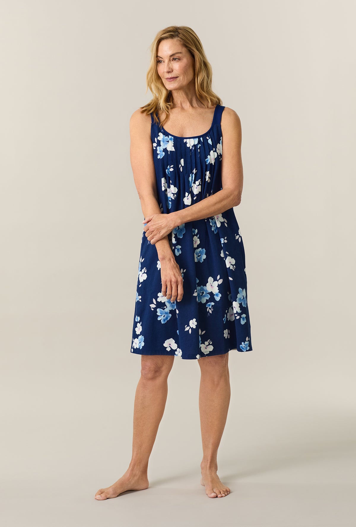 A lady wearing Blue Depths Blooms Cotton Short Chemise