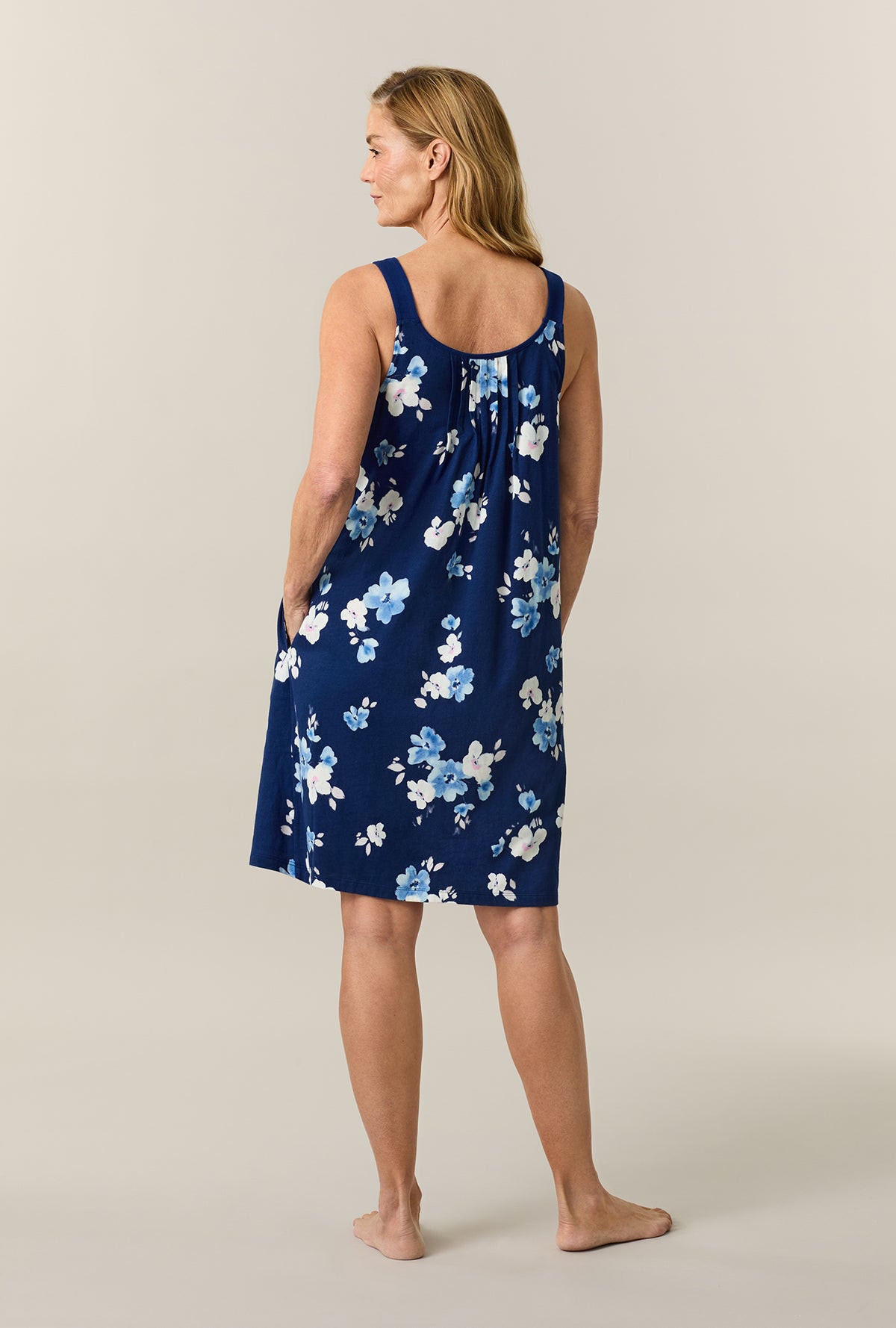 A lady wearing Blue Depths Blooms Cotton Short Chemise
