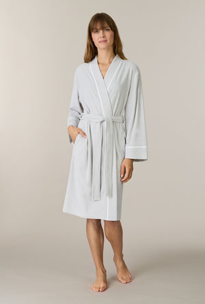 A lady wearing Lunar Rock Terry Wrap Waltz Robe