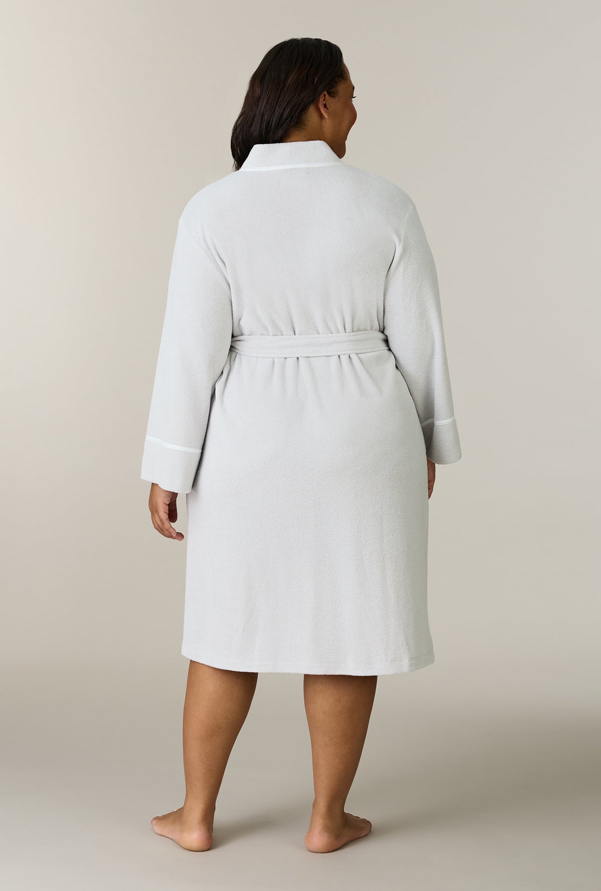 A lady wearing plus size Lunar Rock Terry Wrap Waltz Robe back view