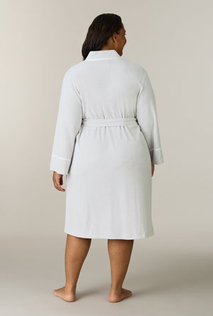 A lady wearing plus size Lunar Rock Terry Wrap Waltz Robe back view