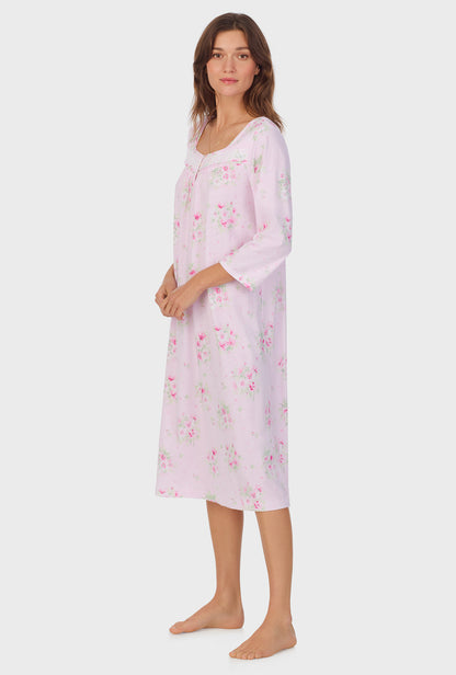 A lady wearing Pink Cosmos 3/4 Sleeve Cotton Waltz Nightgown