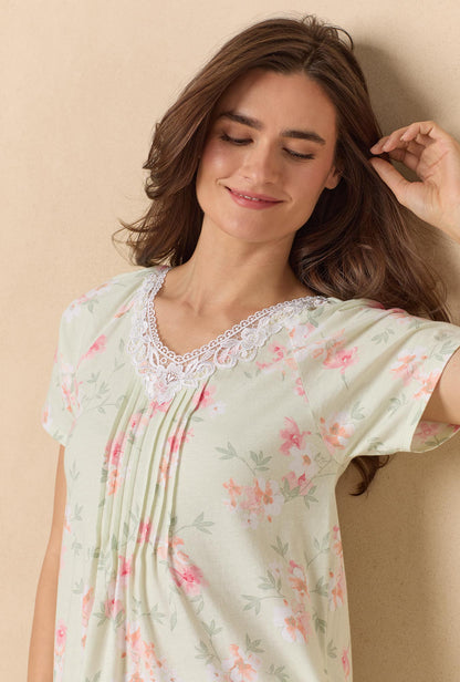 A lady wearing Sage Floral Bloom Waltz Cotton Knit Nightgown
