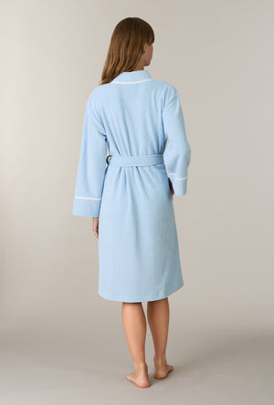 A lady wearing Cashmere Blue Terry Wrap Waltz Robe back view