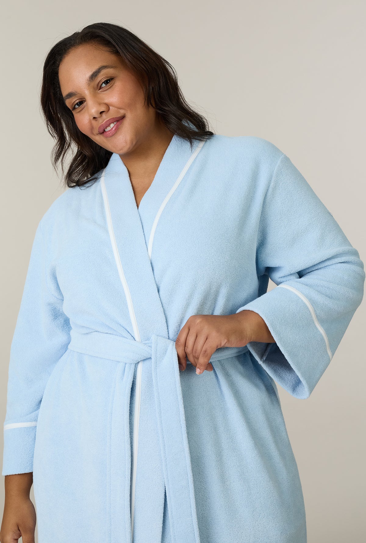 A lady wearing plus size Cashmere Blue Terry Wrap Waltz Robe closer look