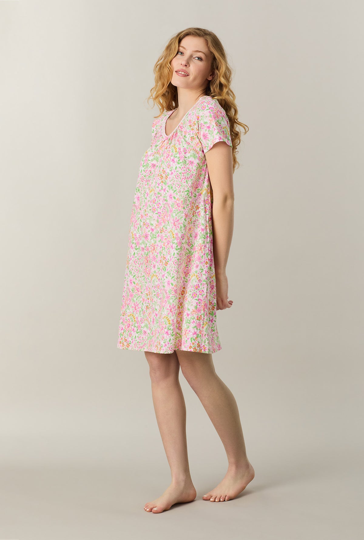 A lady wearing Summer Blossom Short Sleeve Cotton Short Nightgown looking side