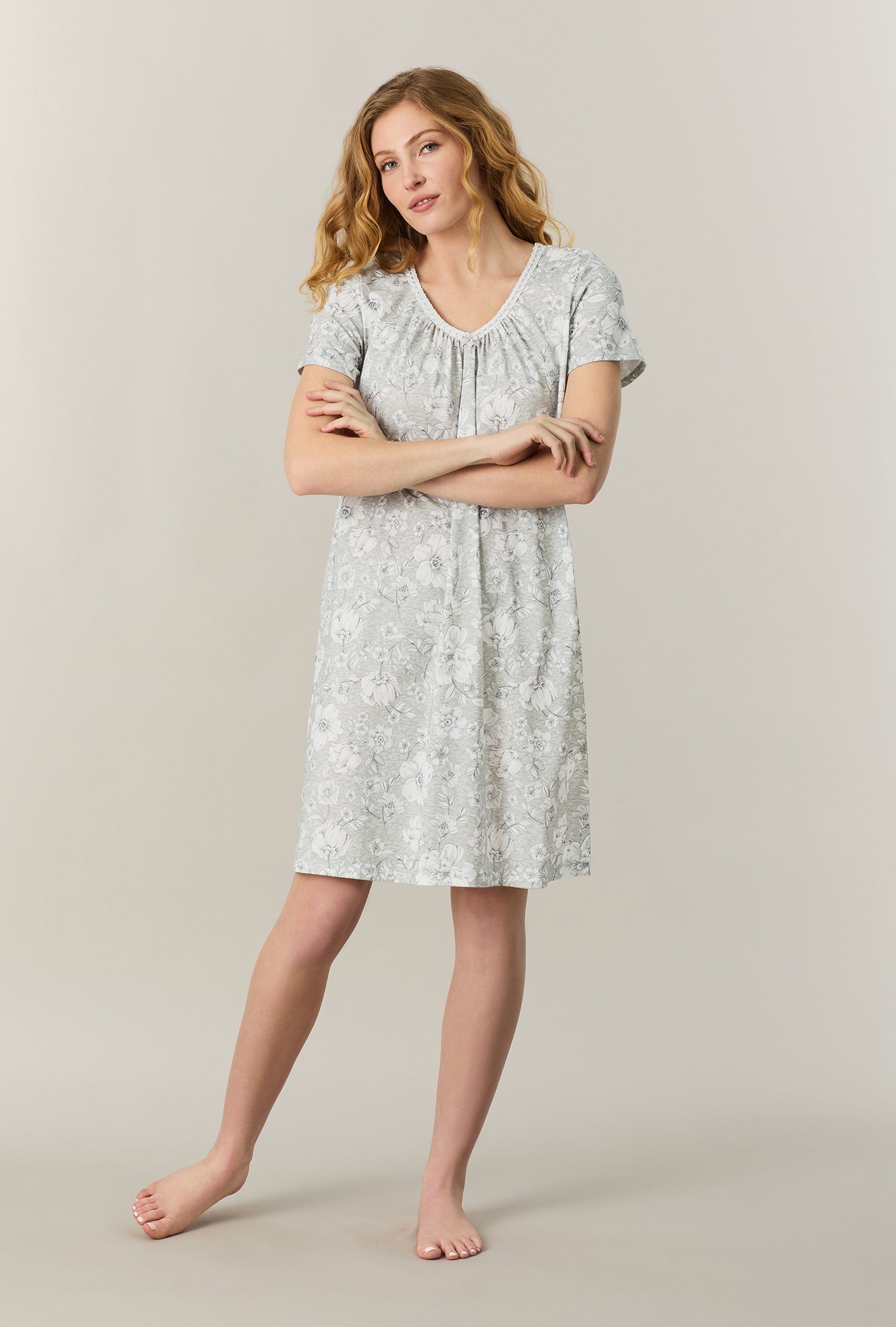 A lady wearing Grey Heather Floral Short Sleeve Cotton Short Nightgown holding a tea cup