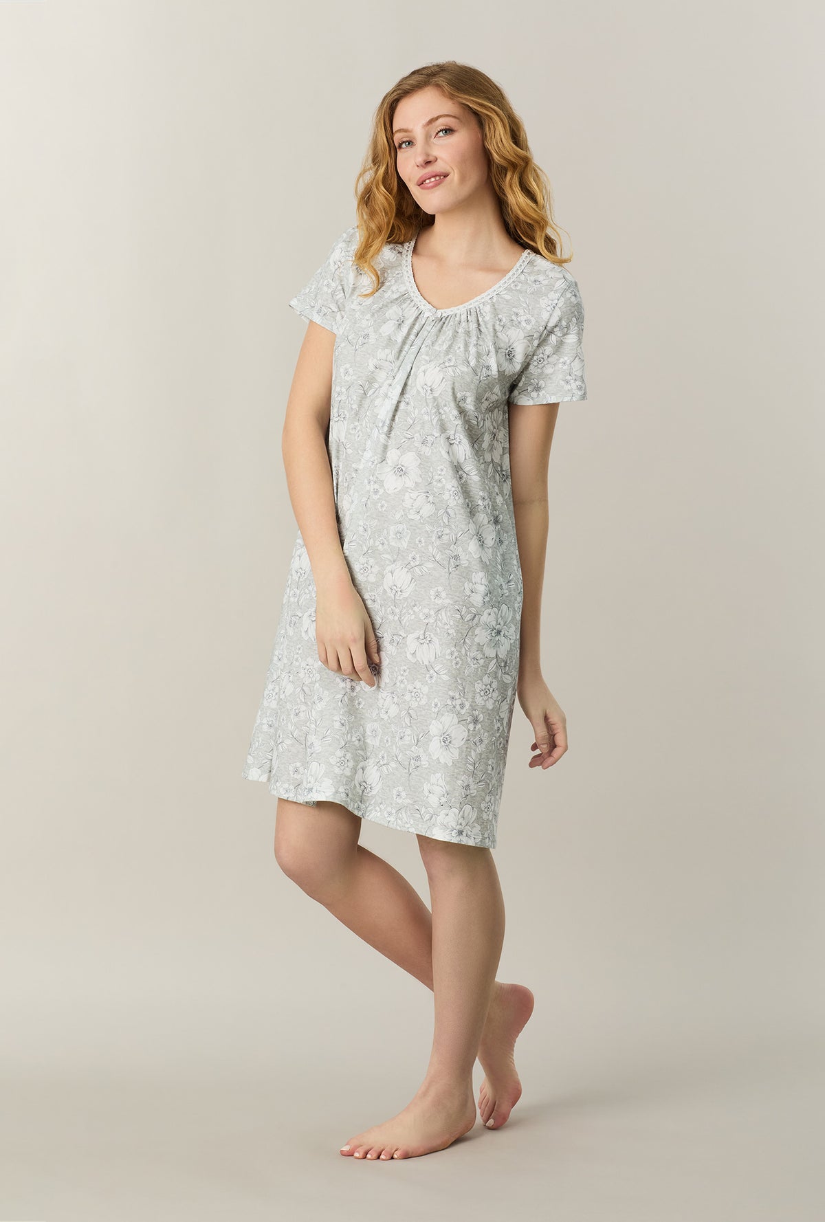 A lady wearing Grey Heather Floral Short Sleeve Cotton Short Nightgown looking left side